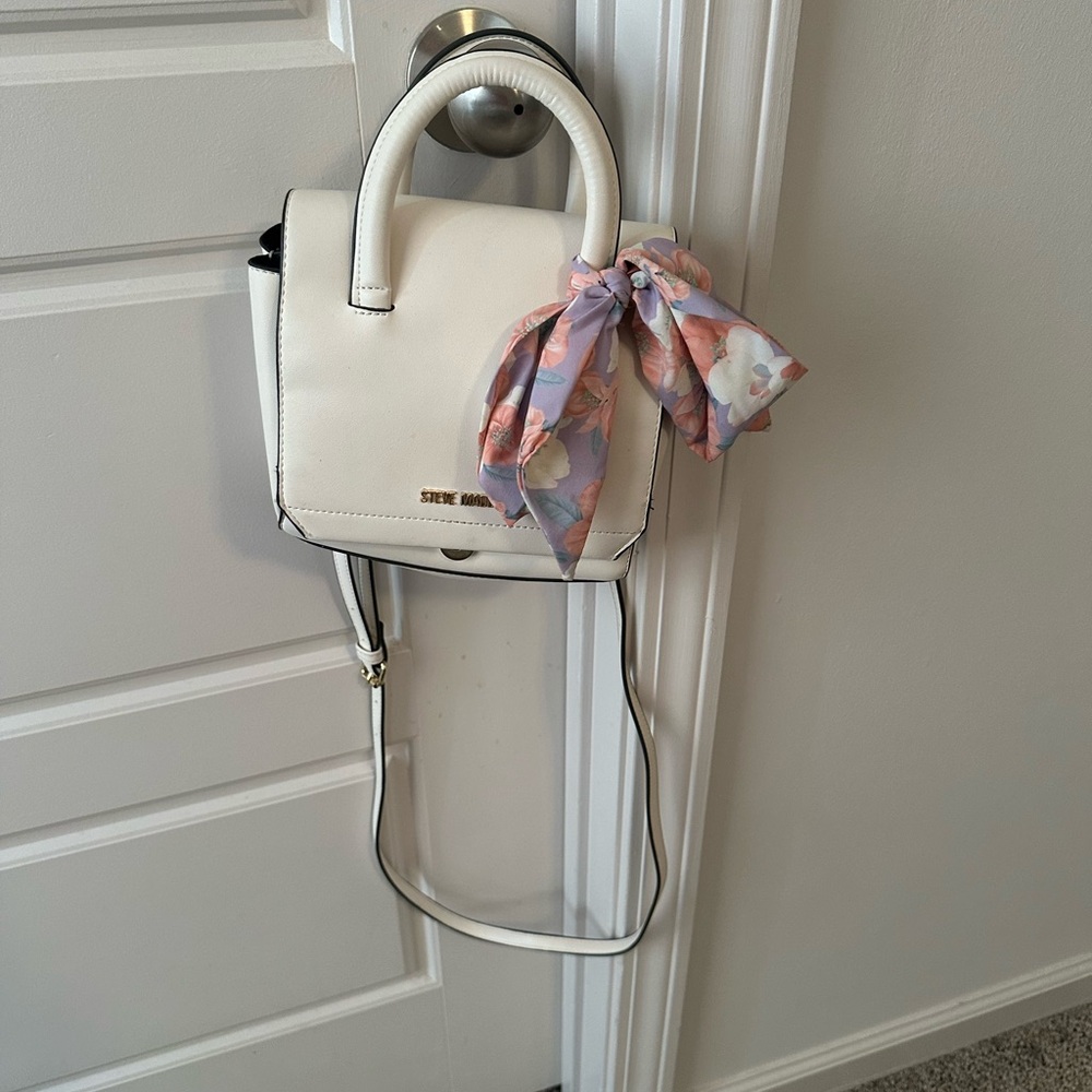 Small, white Steve Madden purse